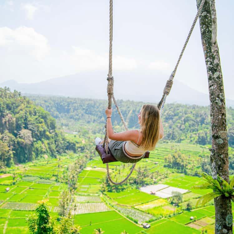 A jungle swing overlooking Bali's green landscape